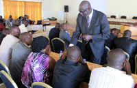 High Court president Johnston Busingye interacting with some of the judges in the meeting yesterday (Photo J Mbanda)