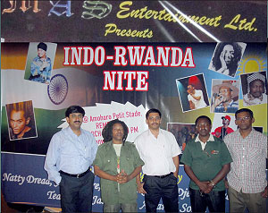 From L-R Binu M. Tharian Thomas, Natty Dread, Irshad Mundockil and the President of Rwandau2019s Artistes Association, Jean Pierre, pose for a photo with another official from MAS Entertainment Ltd. (photo MAS Entertainme)