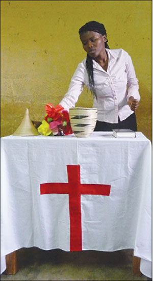 Marie Goreth Nyiraminani at the pulpit of her church. (Photo D.Umutesi)