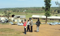 MIDMAR and Red cross officials visiting one of the destroyed schools in Rukomo Sector on Thursday (Photo D. Ngabonziza)