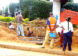 Workers lay national backbone fibre optic cables (File photo)