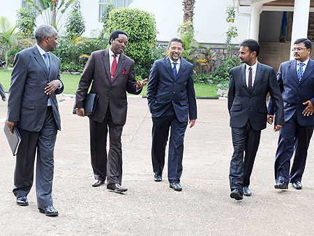 (L-R) Education Minister  Dr Charles Murigande and Rwandau2019s High Comissioner to India, Williams Nkurunziza, chat with Dr Jain and his delegation after meeting President Kagame at Village Urugwiro. (File Photo)
