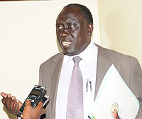 Justice Minister Tharcise Karugarama speaking to reporters