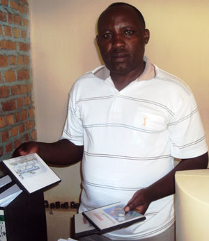 Andre Rugambage, the Chairman of CFR Vocational schools in Eastern Province in his office.(Photo S. Rwembeho)