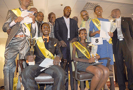 The finalists pose for a photo with the officials.  (Photo / T. Kisambira)