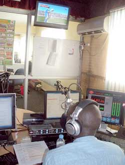 Regis Muramira at the commentating at City Radio's Studio. (File Photo)
