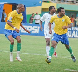 Amavubi Stars midfielder Jean Baptiste Mugiraneza (left), seen in this file photo playing against  Eq. Guinea in 2009, has been drafted to beef up the Olympics team for the Zambia clash. (File photo)