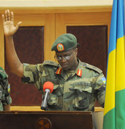 The president of Military High Court Brig. General J Peter Bagabo swearing-in, yesterday. (Photo T.Kisambira).