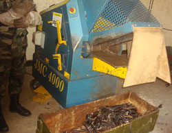 A machine that destroys small firearms was handed to National Police as a way of elimitating the weapons (File Photo).