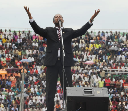 Local musician, Kizito Mihigo singing at the Stadium