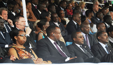 L-R; Chief Justice Aloysie Cyanzayire, EALA Speaker Abdirahin  Abdi ,  Senate President Vincent Biruta and CNLGu2019s Jean de Dieu Mucyo at the Stadium..