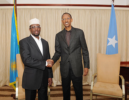 President Kagame with the President of Somalia, Sheik Sharif Ahmed, yesterday in Kigali. (Photo Village Urugwiro)