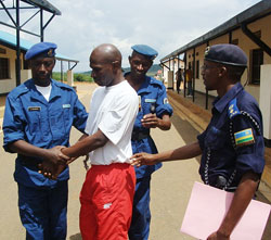 The suspect was, yesterday, handed over to Burundian Police officials. (Courtesy photo).