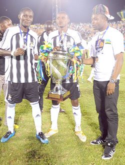 Former APR captain Patrick Mafisango showing off the 2010 Cecafa Kagame Cup moments after APR's 2-1 win over St. George in the final. (File Photo)