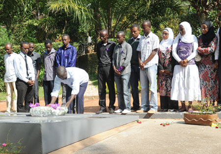 Rwandan students repatrieted from Libya honour Genocide victims yesterday ( Photo T.kisambira)