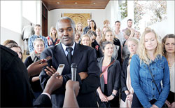 Minister Murigande speaks to reporters after meeting President Kagame at Village Urugwiro, yesterday. Looking on are Danish students. (Photo Village Urugwiro)