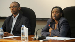 Trade and Industry Minister, Monique Nsanzabaganwa, (R) with Regis Gatarayiha, the Acting Director of RURA, during a talk show on the mounting fuel prices at Telcom House, Kigali.