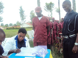 Local Defense personnel queue for voluntary HIV testing and couselling  in Rwamagana. (Photo by S. Rwembeho)