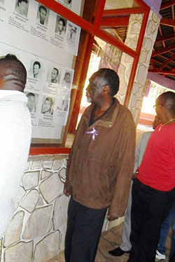 Ombudsman Tito Rutaremara tours the University memorial site in Butare over the weekend. (Photo J Bucyesenge)