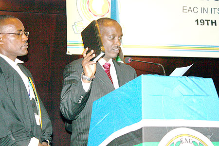 Dr Sezibera takes oath after being appointed new EAC Secretary General, yesterday. (Courtesy Photo).