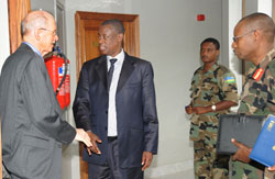 Defence Minister  James Kabarebe (C) chats with Dane Smith after their meeting at the Ministry of Defense, yesterday. (Photo J Mbanda).