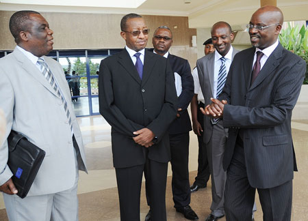 RRA Commissioner General, Ben Kagarama (R) with his DRC counterpart Deo Rugwiza, (2nd Left) and his delegation after signing the MoU yesterday. (Photo J Mbanda).