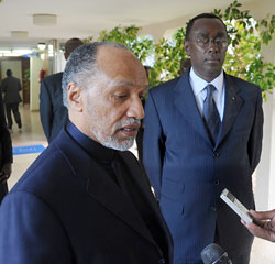 Mohamed Bin Hammam adressing the press during his visit to Rwanda. Looking on his Prime Minister Bernard Makuza. (File Photo).