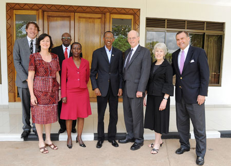 President Kagame poses for a group photo with Ambassador Dane Smith, the latteru2019s family and US and Rwandan government officials. (Photo Urugwiro Village).
