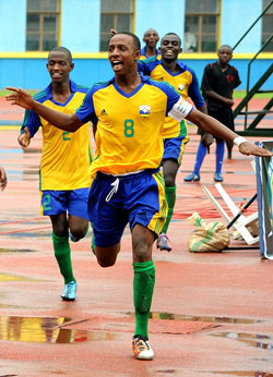 Junior Wasps captain Emery Bayisenge (R) celebrates during the 2011 Caf U-17 Championship. (File Photo)