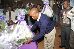 The New Times Managing Director Joseph Bideri leads the Company Staff in paying tribute to Genocide victims at Ntarama. (Photo J Mbanda).