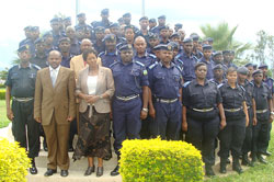 Police officers and RIAM and capacity building secretariat officials pose for a group photo after the opening of the training.