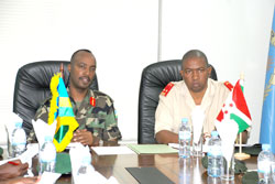 RDF Chief of Defence Staff Lt Gen Charles Kayonga (L) and his Burundian counterpart Maj. Gen. Godefroid Niyombare during their meeting yesterday (Courtesy Photo).