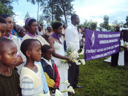 Youth survivors conduct prayers at the Rwamagana memorial  site moments before they took part in a five kilometre walk (Photo by S. Rwembeho).