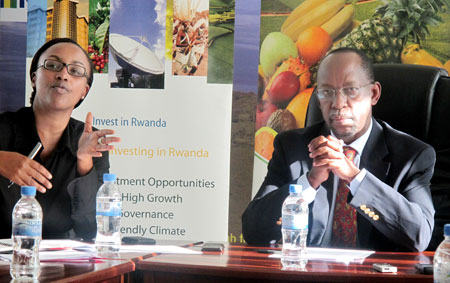 The CEO of RDB, John Gara (R) and Vivian Kayitesi,the Head of Division-Investor Aftercare and Monitoring at RDB talk ing to the press yesterday (Photo T.Kisambira)