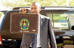 Fiinance Minister, John Rwangombwa, heading to Parliament to present the National Budget for the FY 2010-11 (File photo)