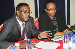 The PS in the Ministry un charge of ICT, David Kanamugire (L) and his counterpart in the Ministery of Education, Sharon Haba, during the one day conference.