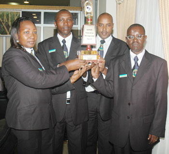 Immigration staff with an award they one for exceptional services. (File Photo)