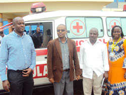 Mayor Protais Murayira (2nd L) with PIH officials after receiving the two ambulances [1]. Photo by S. Rwembeho.