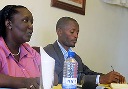 (L-R)Domitilla Mukantaganzwa, head of Gacaca Commission, together with Denis Bikesha, the officer  in charge of training during the news conference yesterday (Photo T.Kisambira)