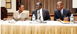 (L-R)Mary Gahonzire, the Commissioner General of Prisons, Minister Tharcisse Karugarama and Jarus Matiya Advisor and head of Justice sector at the commonwealth secretariat (Photo T.Kisambira)