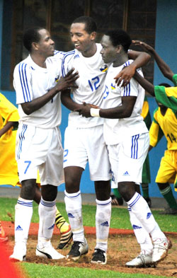 Justin Mico (C) is  mobbed by teammates during the 2011 Africa U-17 Championship. (File photo)