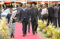 Premier Bernard Makuza flanked by High Commissioner Frank Mugambage arrive for the swearing in of Uganda's President Museveni (Photo G Muramila)
