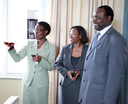 New MINICOM Minister Francois Kanimba takes a guided tour from his predecessor Monique Nsanzabaganwa (centre), yesterday (Photo T Kisambira)