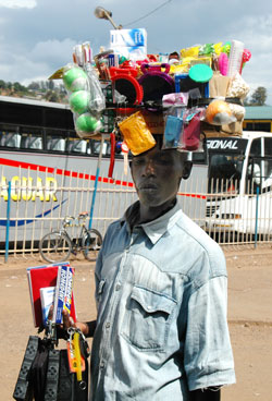 A hawker in a Kigali street. Traders have lamented hawkers are killing their businesses (File Photo).