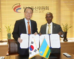 Choi See Joong, the Chairman of KCC-South Korea with Ignace Gatare the Minister in President's office in charge of ICT after signing the cooperation agreement (Courtesy photo)