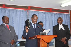 EAC Secretary General Dr Rchard Sezibera taking oath at EALA in Arusha (Courtsey Photo)
