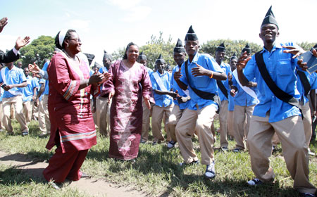 Parents celebrated with their children after the graduation ceremony at Iwawa Rehabilitation Centre. (Photo T Kisambira)