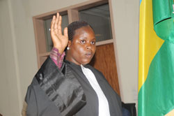One of the lawyers takes oath prior to joining the Bar Association (Photo J Mbanda)