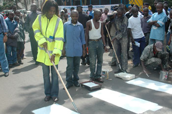 Painting a Zebra crossing during the Road Safty week. Clear road signs can reduce accidents.(File photo)