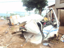 The wreckage of an oil tanker that claimed the lives of four bystanders and its driver after failed to negotiate a sharp corner at Cyanuzi (Photo S. Rwembeho)